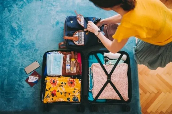 girl packing for travel